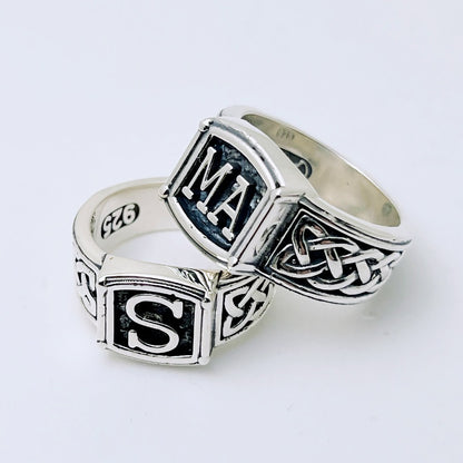 Handcrafted sterling silver initial ring with braided band and dark background – personalized family ring by Atlas Jewelry